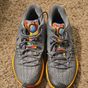 Nike Gray Knit Sneakers with Multicolor Tongues and Yellow-Orange Soles